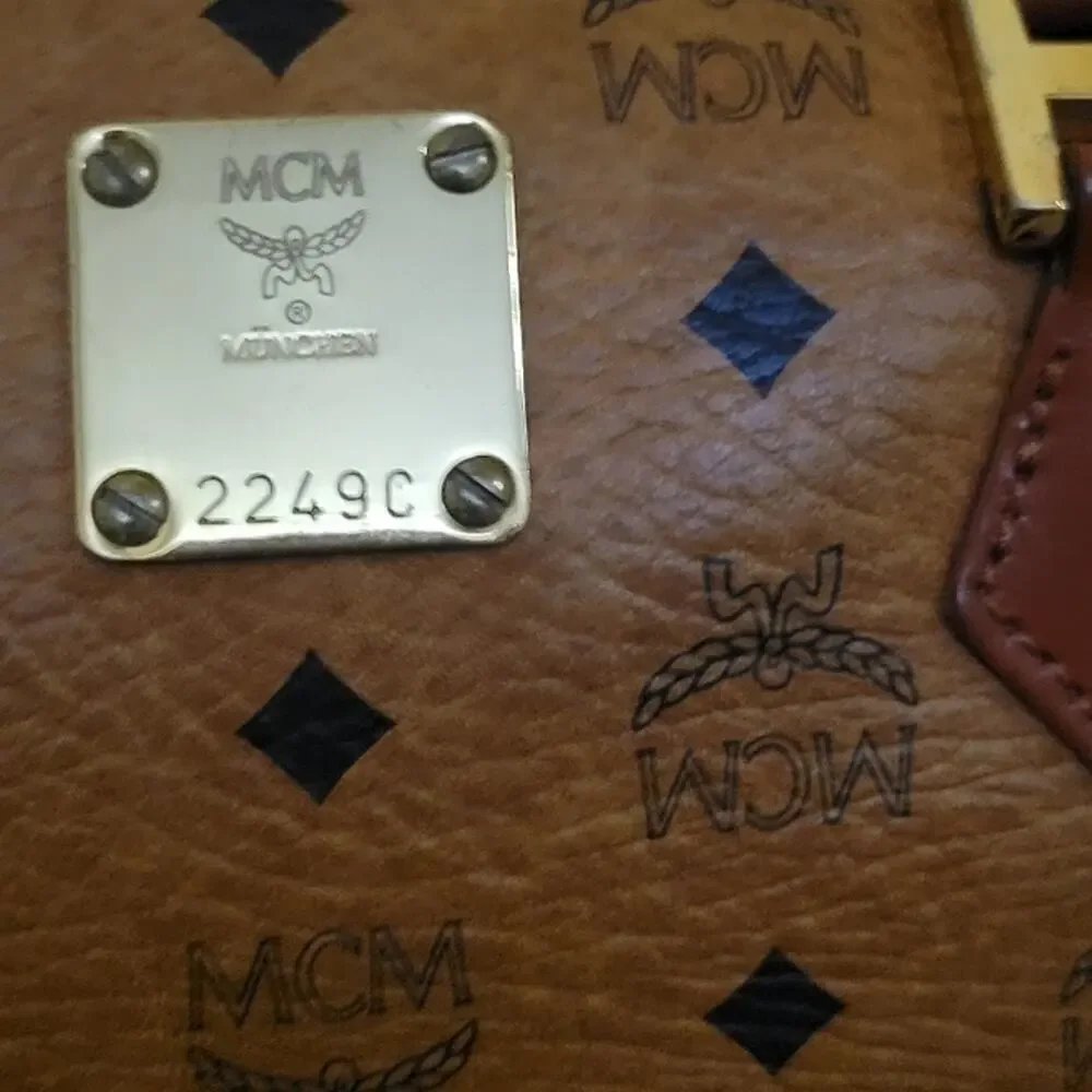 Authentic MCM Vintage Cognac Monogram Leather Visetos Boston Bag